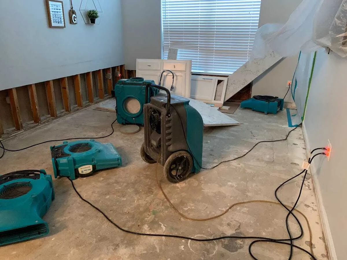 Dehumidifier in flood-cut room for Water Damage Restoration in Royal Kunia