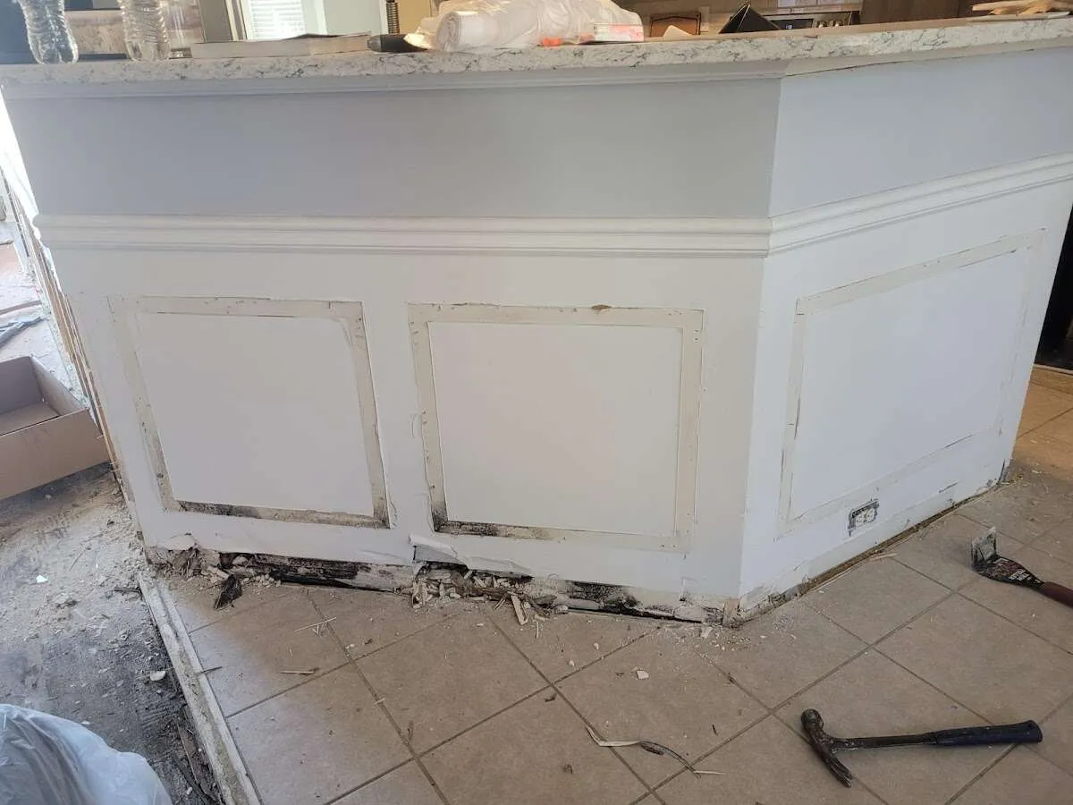 Water damage and mold on kitchen during Storm Damage Restoration in Royal Kunia